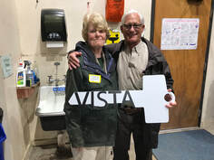 Picture Sandra Roe Smith giving the key to Vista to Refuge Manager Andrew Gude