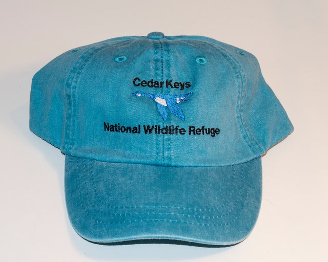image of blue hat with Cedar Keys NWR logo