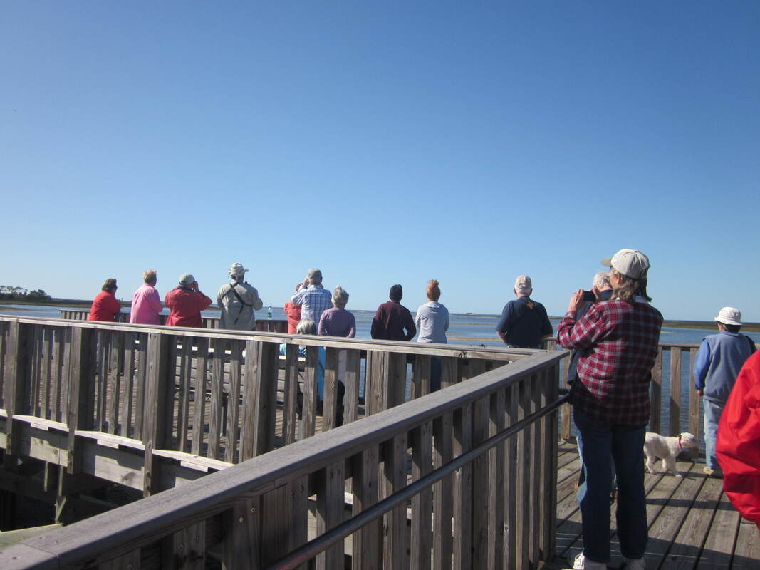 Picture of visitors on the Shell Mound pier