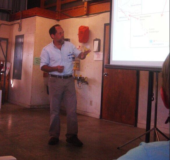 Picture of Peter Frederick speaking at a Friends Annual Meeting  about the Lone Cabbage Oyster Reef Restoration project