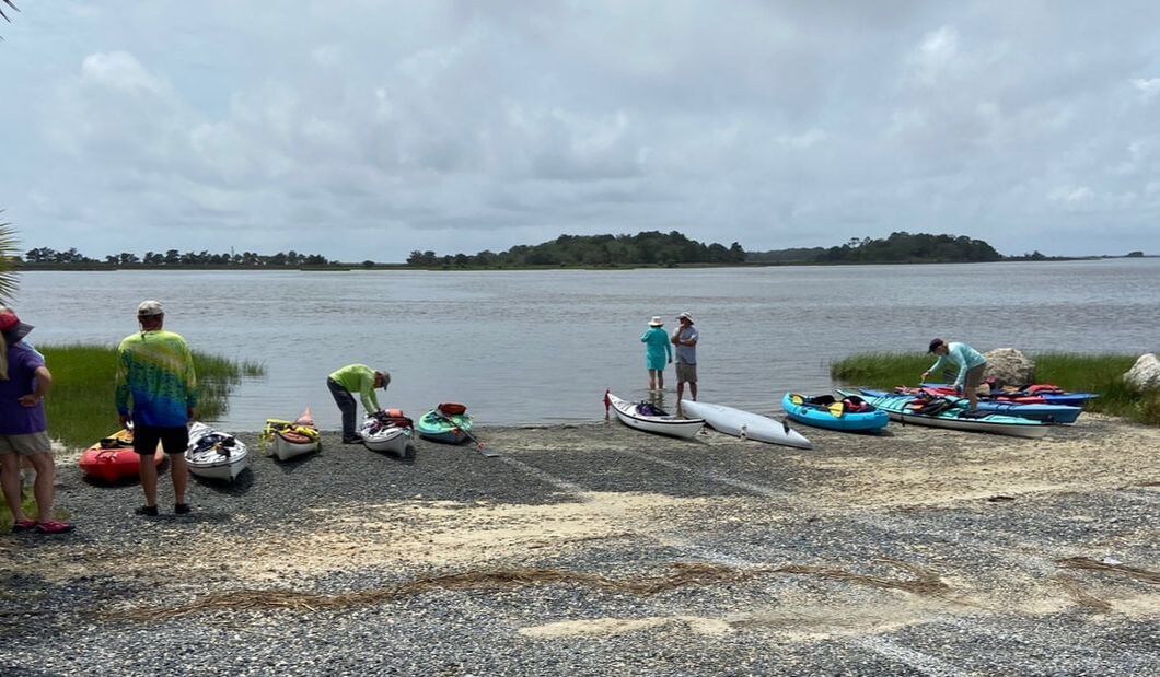 Picture of kayakers at water's edge Getting ready for the kayak tour. 
