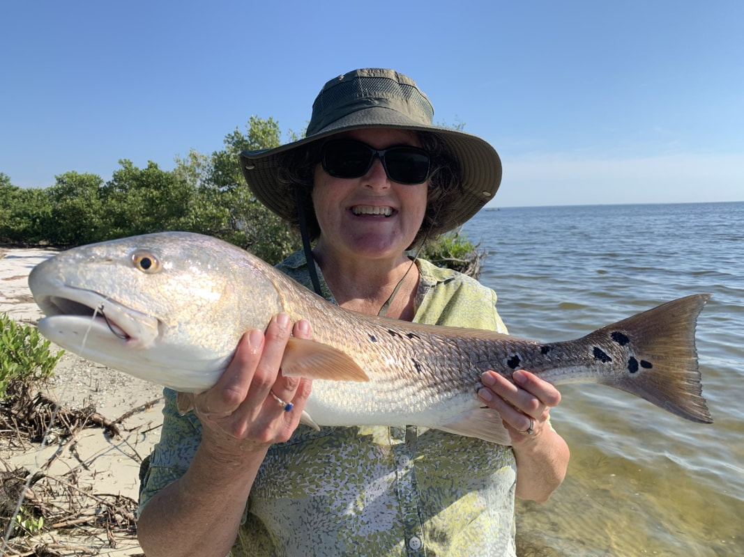 Picture of woman with redfish